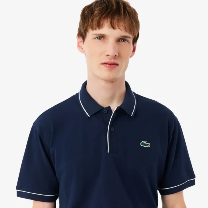 Polo de golf de mini piqué con regulación térmica