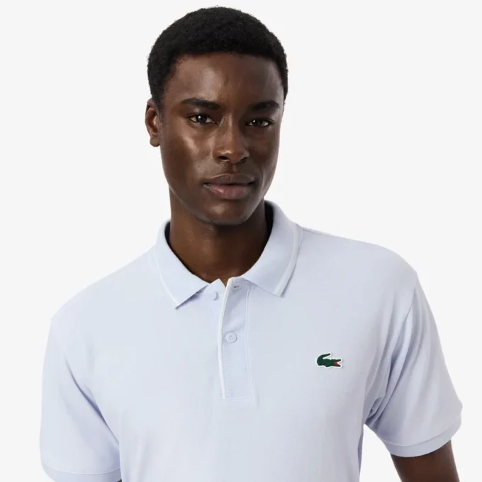 Polo de golf de mini piqué con regulación térmica