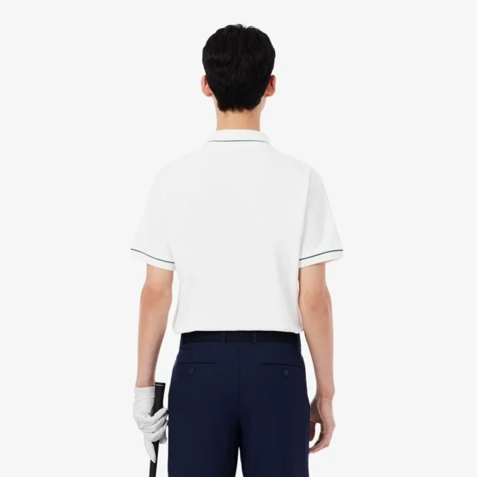 Polo de golf de mini piqué con regulación térmica