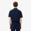 Polo de golf de mini piqué con regulación térmica