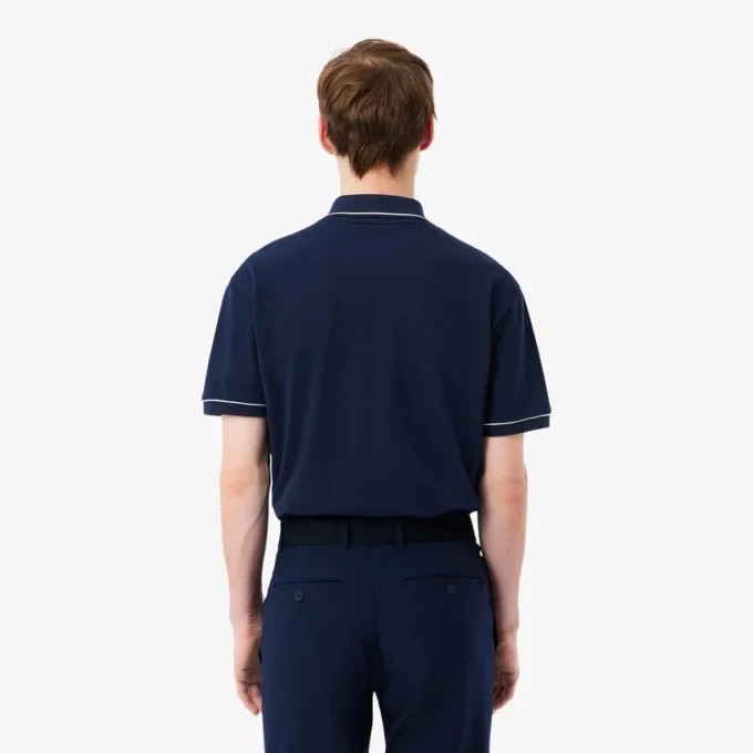 Polo de golf de mini piqué con regulación térmica
