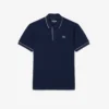 Polo de golf de mini piqué con regulación térmica