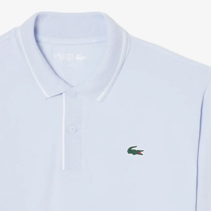 Polo de golf de mini piqué con regulación térmica