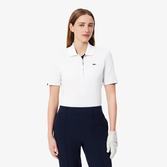 Polo de golf elástico con protección UV y corte entallado para mujer