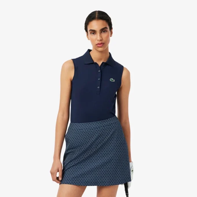 Polo de golf elástico con protección UV y corte entallado para mujer