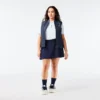 Polo de golf elástico con protección UV y corte entallado para mujer