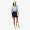 Polo de golf elástico con protección UV y corte entallado para mujer