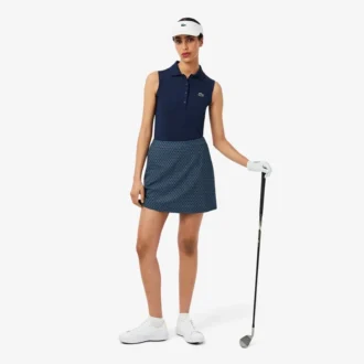 Polo de golf elástico con protección UV y corte entallado para mujer