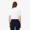 Polo de golf elástico con protección UV y corte entallado para mujer