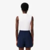Polo de golf elástico con protección UV y corte entallado para mujer