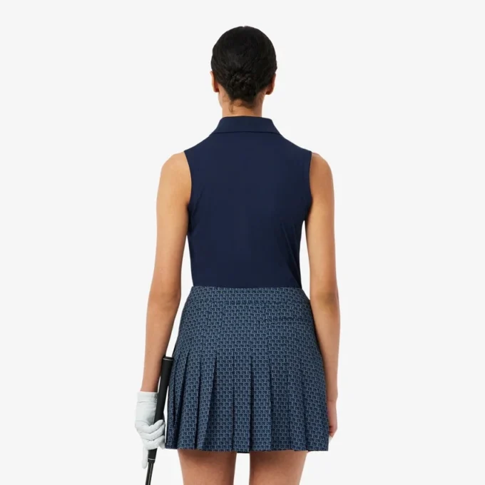 Polo de golf elástico con protección UV y corte entallado para mujer