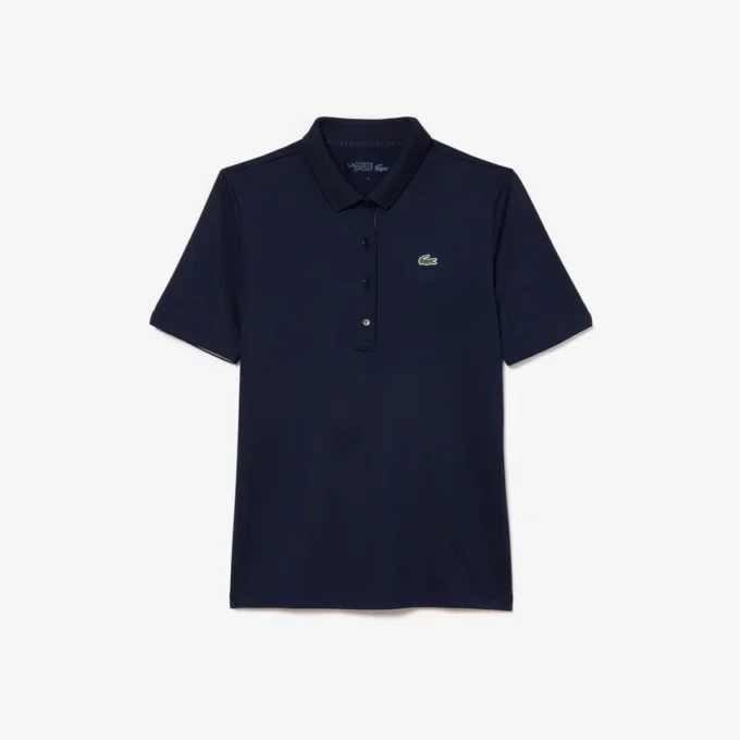 Polo de golf elástico con protección UV y corte entallado para mujer
