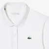 Polo de golf elástico con protección UV y corte entallado para mujer