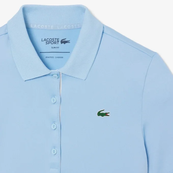 Polo de golf elástico con protección UV y corte entallado para mujer