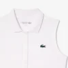 Polo de golf elástico con protección UV y corte entallado para mujer