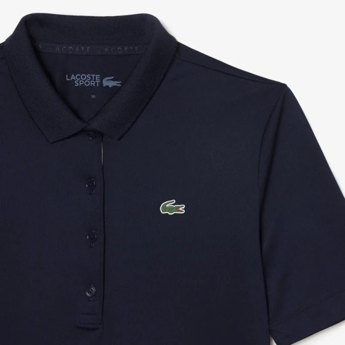 Polo de golf elástico con protección UV y corte entallado para mujer