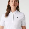 Polo de golf elástico con protección UV y corte entallado para mujer