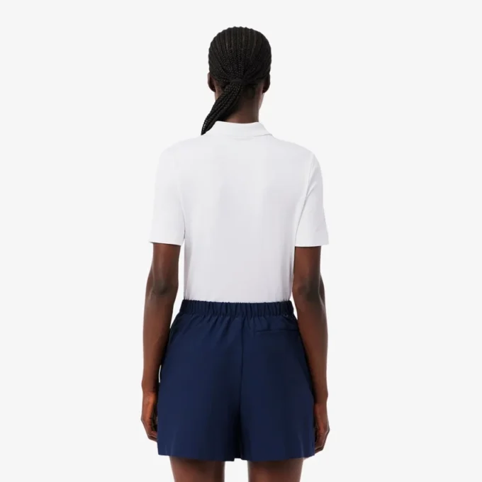 Polo de golf elástico Slim Fit con protección UV