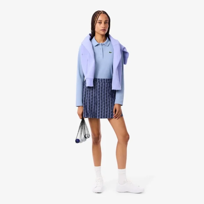 Polo de golf termorregulador con protección UV para mujer