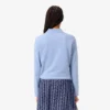 Polo de golf termorregulador con protección UV para mujer