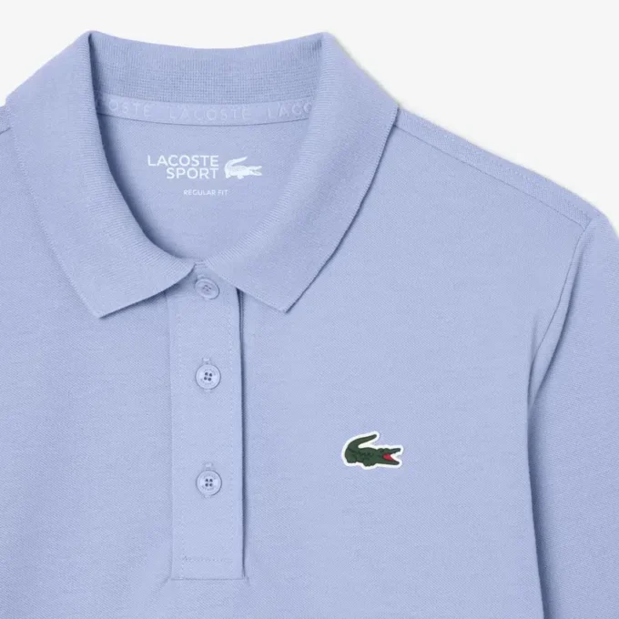 Polo de golf termorregulador con protección UV para mujer
