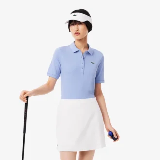 Polo de golf termorregulador de corte ajustado para mujer
