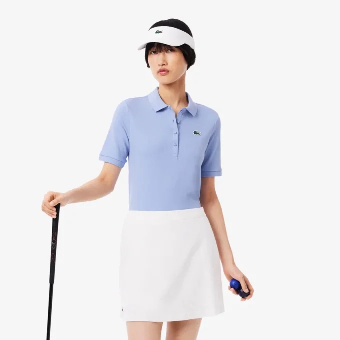 Polo de golf termorregulador de corte ajustado para mujer