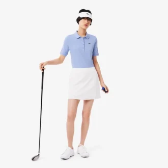Polo de golf termorregulador de corte ajustado para mujer