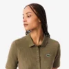 Polo de golf termorregulador de corte ajustado para mujer