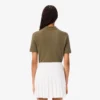 Polo de golf termorregulador de corte ajustado para mujer