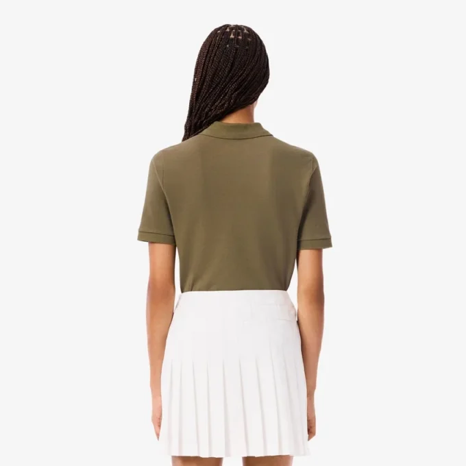 Polo de golf termorregulador de corte ajustado para mujer