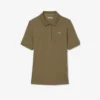 Polo de golf termorregulador de corte ajustado para mujer