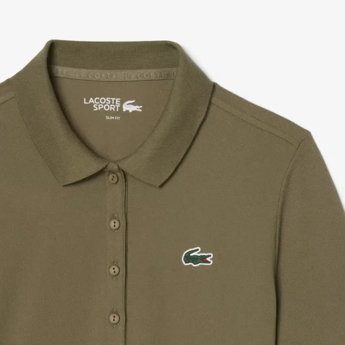 Polo de golf termorregulador de corte ajustado para mujer