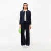 Polo de golf Ultra Dry Stretch de corte ajustado para mujer