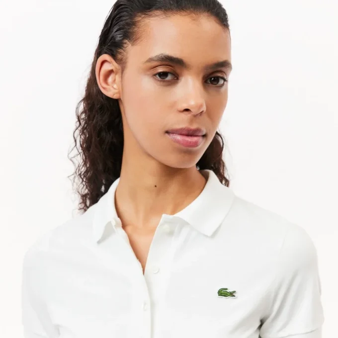Polo de golf Ultra Dry Stretch de corte ajustado para mujer