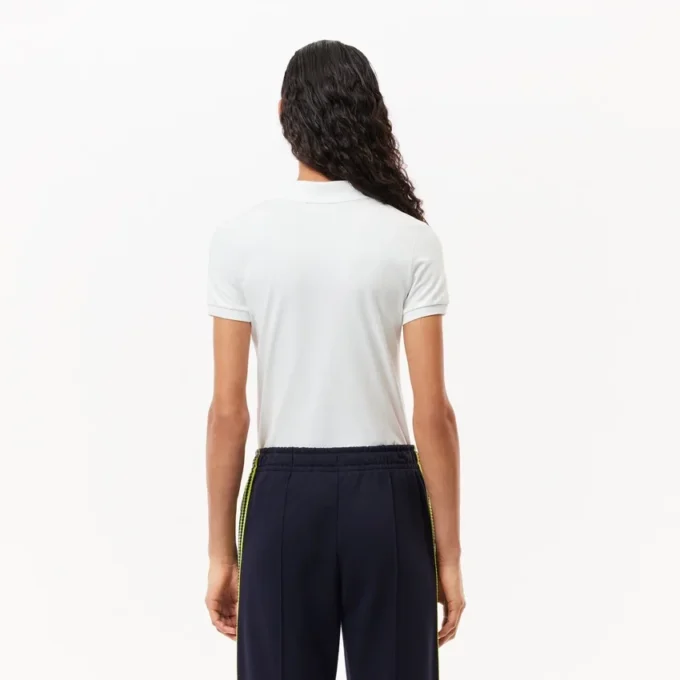 Polo de golf Ultra Dry Stretch de corte ajustado para mujer