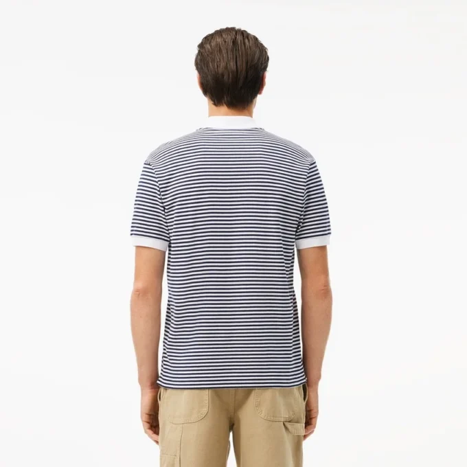 Polo de hombre L.12.12 de corte clásico con rayas y tejido Petit Piqué