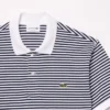 Polo de hombre L.12.12 de corte clásico con rayas y tejido Petit Piqué