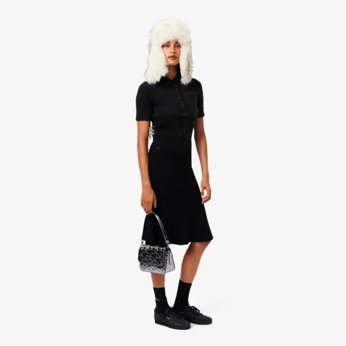 Polo de mujer de punto elástico con corte entallado