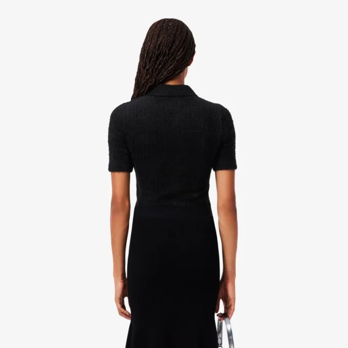 Polo de mujer de punto elástico con corte entallado