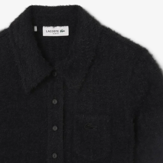 Polo de mujer de punto elástico con corte entallado