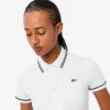 Polo de mujer L.12.D de corte entallado con detalles de ribete