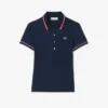 Polo de mujer L.12.D de corte entallado con detalles de ribete