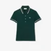 Polo de mujer L.12.D de corte entallado con detalles de ribete