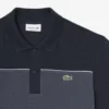 Polo de piqué con bloques de color y corte regular