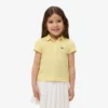 Polo de piqué con cuello festoneado para niña