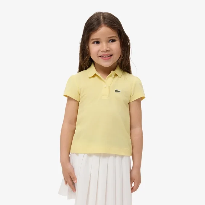 Polo de piqué con cuello festoneado para niña