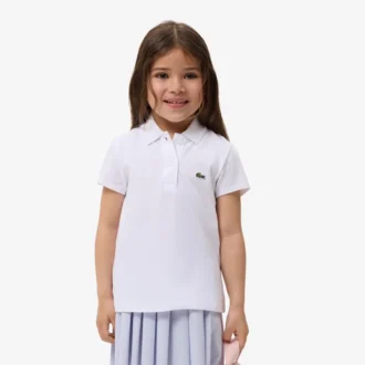 Polo de piqué con cuello festoneado para niña