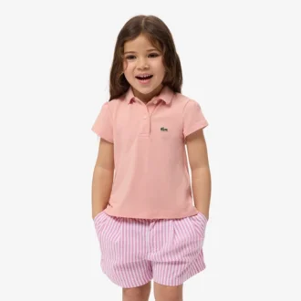 Polo de piqué con cuello festoneado para niña