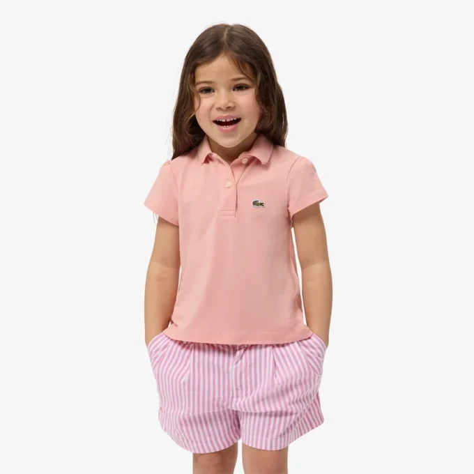 Polo de piqué con cuello festoneado para niña